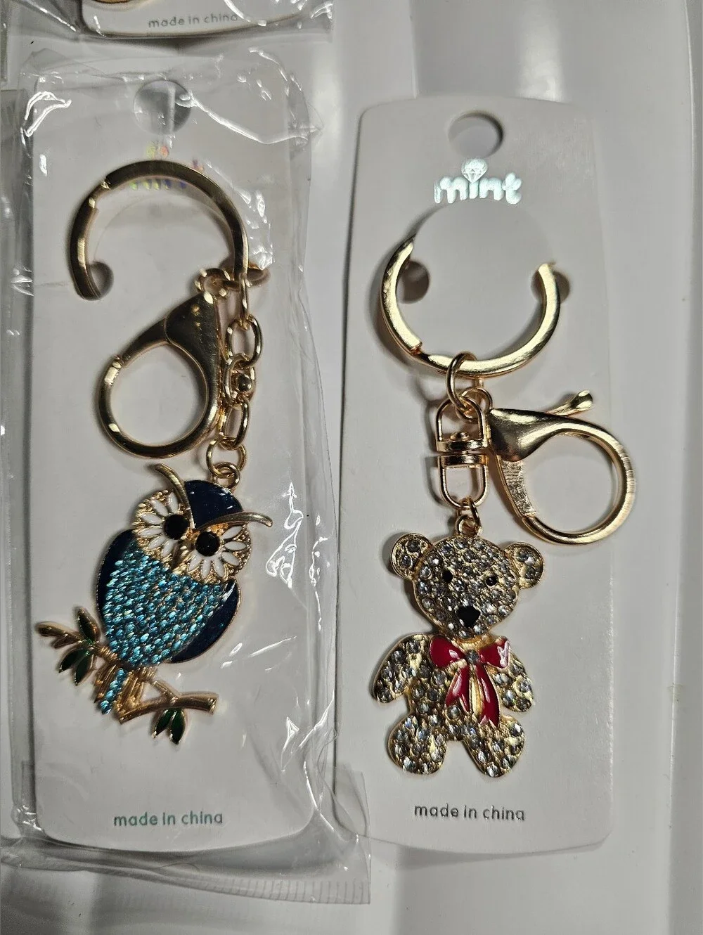 Mint (Pick 1) Gold-Tone Keychains